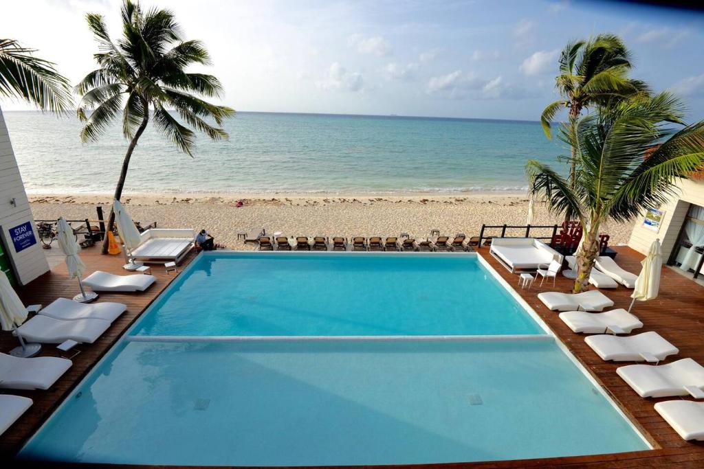Villa Juarez Apartment | Deluxe Suite Beachside, Private Beach Club and Golf