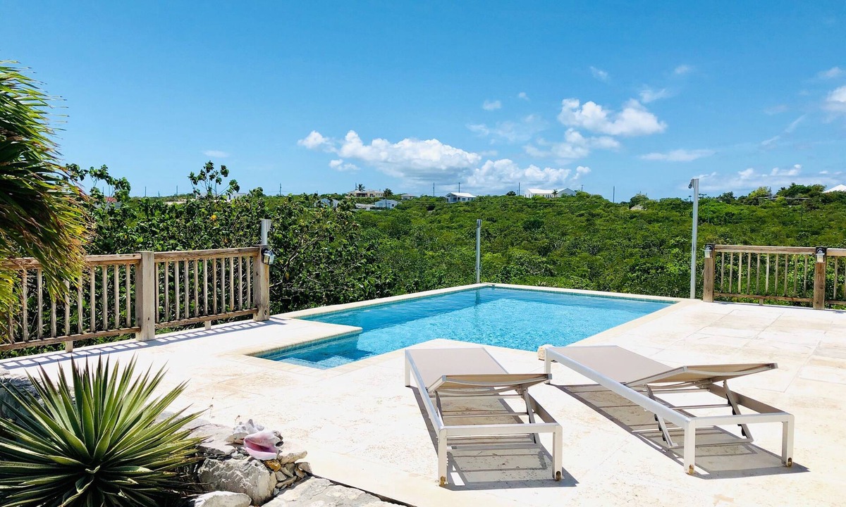 Long Bay Cottage | Flame Tree Cottage. Private home with pool and ocean view. 1/2 mile to beach