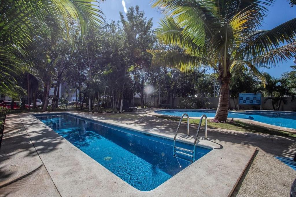 Puerto Juarez House | La Casa del Mexicano terraza y jardin exoticos 12 min del playa Esmeralda