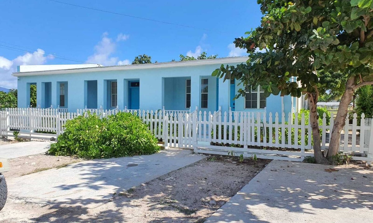 Cockburn Town House | Palmeira-Three Units side by side