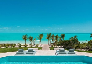 Specials available certain weeks. Magnificent 8 bedroom villa on Long Bay Beach