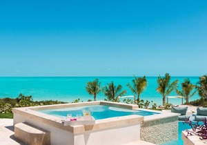 Specials available certain weeks. Magnificent 8 bedroom villa on Long Bay Beach