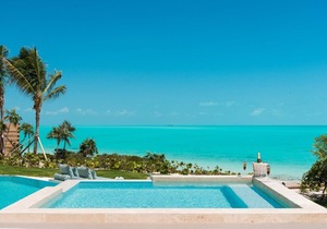 Specials available certain weeks. Magnificent 8 bedroom villa on Long Bay Beach