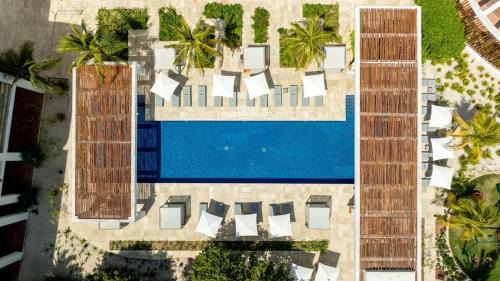 Playa Mujeres Apartment | 2BR Beachfront Exclusive Condo w/Top Features