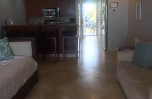 The Bight Condo | Amazing Grace Bay Views, Terraces, Pools & Location! Walk to Beach, Restaurants.