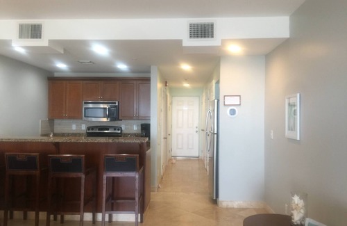 The Bight Condo | Amazing Grace Bay Views, Terraces, Pools & Location! Walk to Beach, Restaurants.
