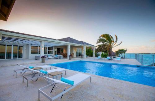 Ocean Point Villa | Crystal Blue Water Front Home with Pool