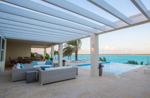 Ocean Point Villa | Crystal Blue Water Front Home with Pool