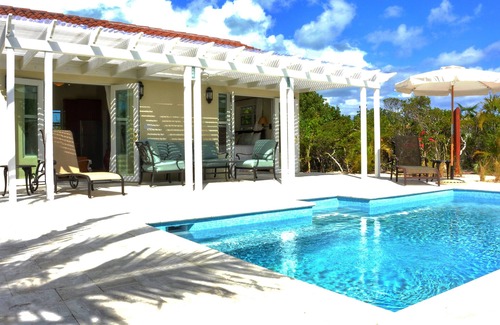 Long Bay Hills House | Enjoy Secluded Cottage w/Pool Jacuzzi Beach Front - Esencia Cottage
