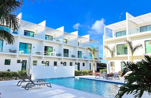 Providenciales Condo | Luxury Townhome rentals in Grace Bay - walk to beach, dining and Fish Fry