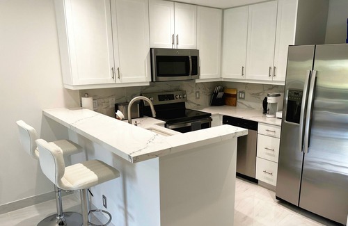 Leeward Settlement Condo | New! Luxury 1Bed Large Condo - Moments from the Beach