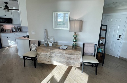 Wheeland Settlement Condo | Seas the Day TCI covered balcony, patio dining, gated entrance, on site security