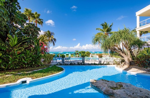 The Bight Condo | Stunning 2 bedroom 2100 sq ft, directly on Grace Bay Beach!