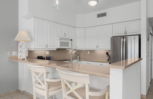 Grace Bay Apartment | Updated Stunning Ocean Club Plaza luxury family spacious top floor apartment
