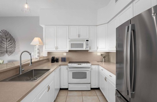Grace Bay Apartment | Updated Stunning Ocean Club Plaza luxury family spacious top floor apartment