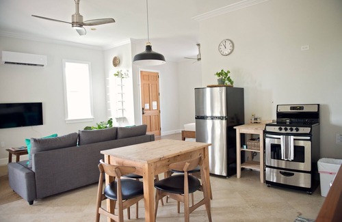 Long Bay Hills Apartment | Very Large Studio & Porch, 5 Min Walk to Beach, Secluded, Tranquil & Green