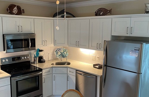 Wheeland Settlement Condo | 1 bdrm second floor , views pool hot tub private beach spacious newly renovated