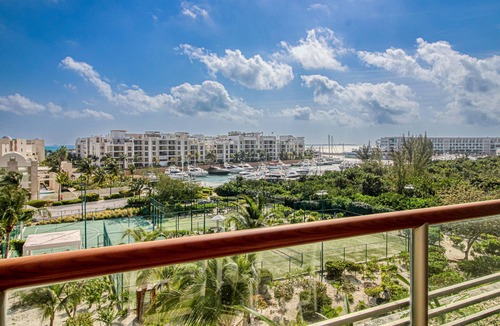 Playa Mujeres Apartment | 4th-Floor Resort Studio with Outdoor Pools, Pool Spas, Tennis, Gym, & Balcony