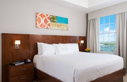 Leeward Settlement Resort | All-Inclusive Escape! Three Oceanfront 1BR, Private Beach, Paddleboarding