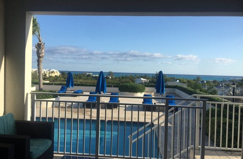 The Bight Condo | Amazing Grace Bay Views, Terraces, Pools & Location! Walk to Beach, Restaurants.