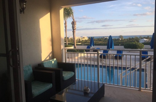 The Bight Condo | Amazing Grace Bay Views, Terraces, Pools & Location! Walk to Beach, Restaurants.