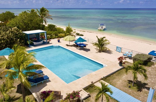 Cockburn Town Villa | Beach front villa with private pool & panoramic ocean views