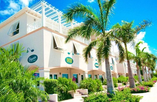 Grace Bay Condo | BEST LOCATION on Grace Bay! PLAZA at OCW, No Car Needed!
