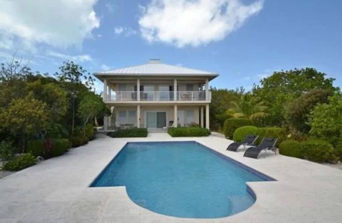 Providenciales Apartment | Breezy, eco-friendly, with pool and lagoon view