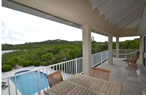 Providenciales Apartment | Breezy, eco-friendly, with pool and lagoon view