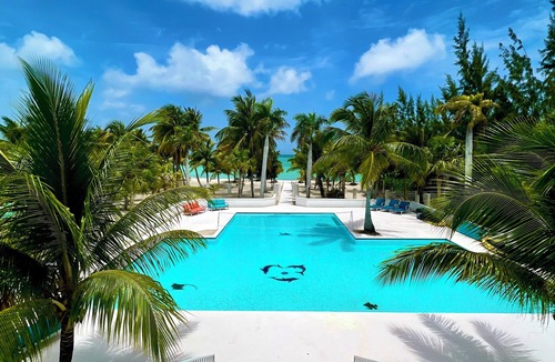Sandy Point House | Calm Waters - Private Beachfront Villa. No Crowds. Just Ocean.