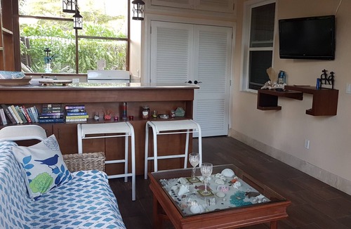 Leeward Settlement Cottage | Charming Garden Cottage on the canal in Leeward
