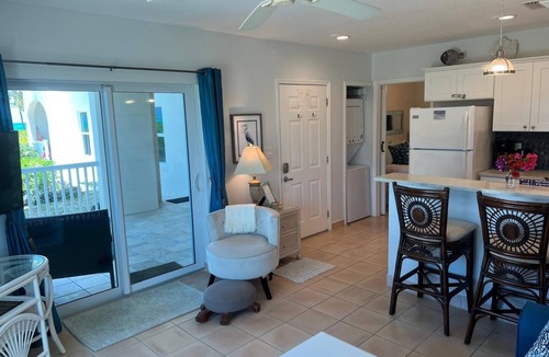 Wheeland Settlement Condo | Corner Ground Floor Oceanfront/Stunning Ocean Views & Easy Beach Access.