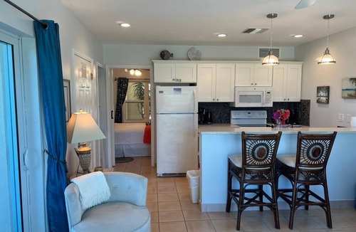 Wheeland Settlement Condo | Corner Ground Floor Oceanfront/Stunning Ocean Views & Easy Beach Access.