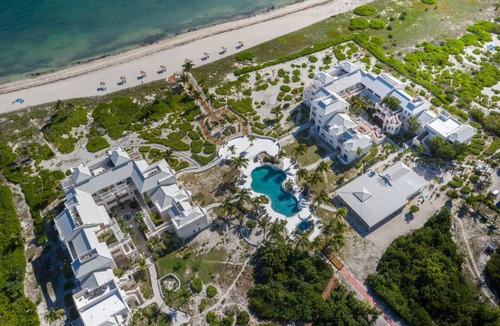 Wheeland Settlement Condo | Couple’s Retreat! Condo with ocean views, pool, and hottub!