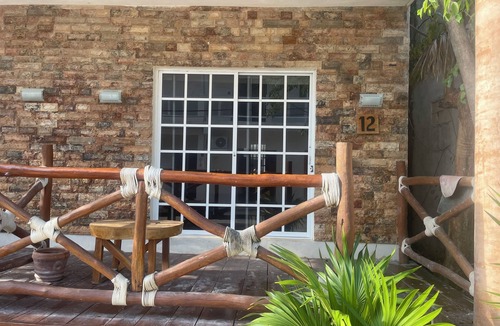 Downtown Holbox Apartment | Cozy apartment in charming Holbox with AC, WiFi cuarto en planta baja