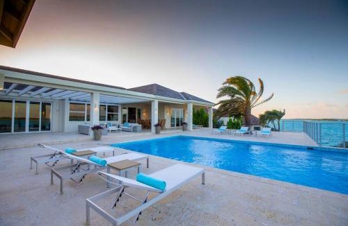 Ocean Point Villa | Crystal Blue Water Front Home with Pool