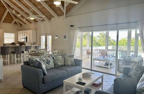 Providenciales Villa | Enjoy the oceanview and relax poolside. Steps to World Famous Grace Bay Beach.