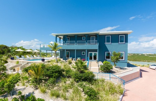 Venetian Road Settlement Villa | Gorgeous Waterfront Villa w/HUGE Outdoor Patio & Concierge Services!