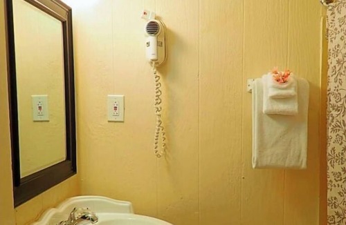 Cockburn Town House | JACKS - Grand Turk B&B Courtyard room with Queen bed - Grand Turk Island!
