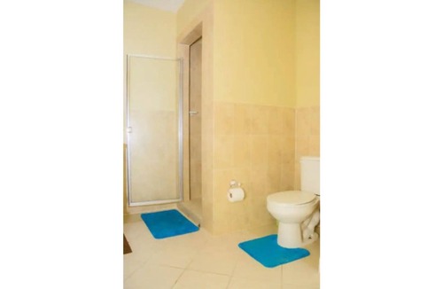 Leeward Settlement House | Kenai’s Place - A One Bedroom Suite just 2 mins away from Grace Bay Beach