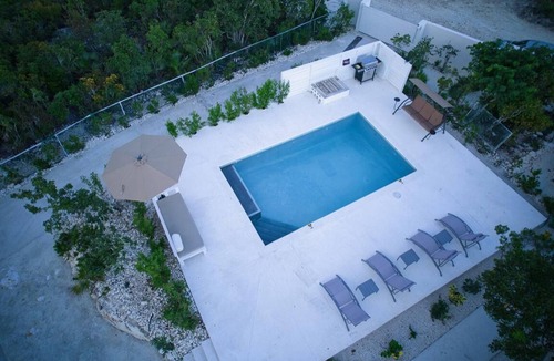 Discovery Bay Villa | Luxury Newly built two-bedroom modern Sunset villa with pool in Discovery Bay!