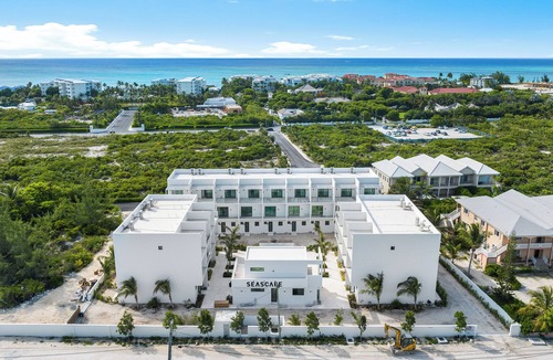 Providenciales Condo | Luxury Townhome rentals in Grace Bay - walk to beach, dining and Fish Fry