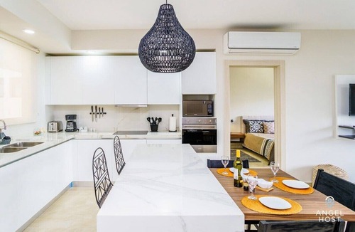 Villa Juarez Condo | Modern Escape | Nature Views | Gym | Lagoon Access