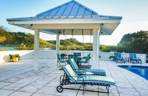 Venetian Road Settlement Villa | Modern Flamingo Lake Villa