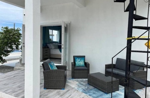 Cockburn Town House | Modern ocean villa with heated pool