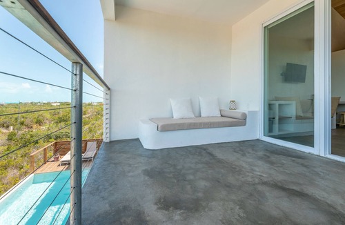 Long Bay Apartment | Modern Studio with Expansive Ocean View, Pool