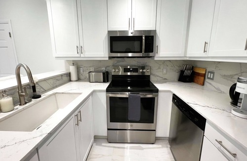 Leeward Settlement Condo | New! Luxury 1Bed Large Condo - Moments from the Beach