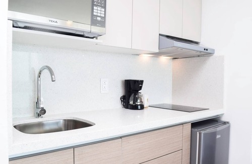 Zona Hotelera Apartment | New studio, stunning lagoon views, beach access