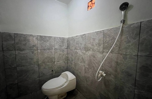 Mengwi Hotel | OYO 94014 The Sanya Homestay