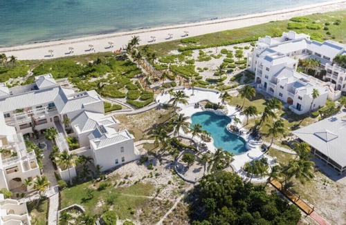 Wheeland Settlement Condo | Paradise Point Ocean and Pool View 2 king beds